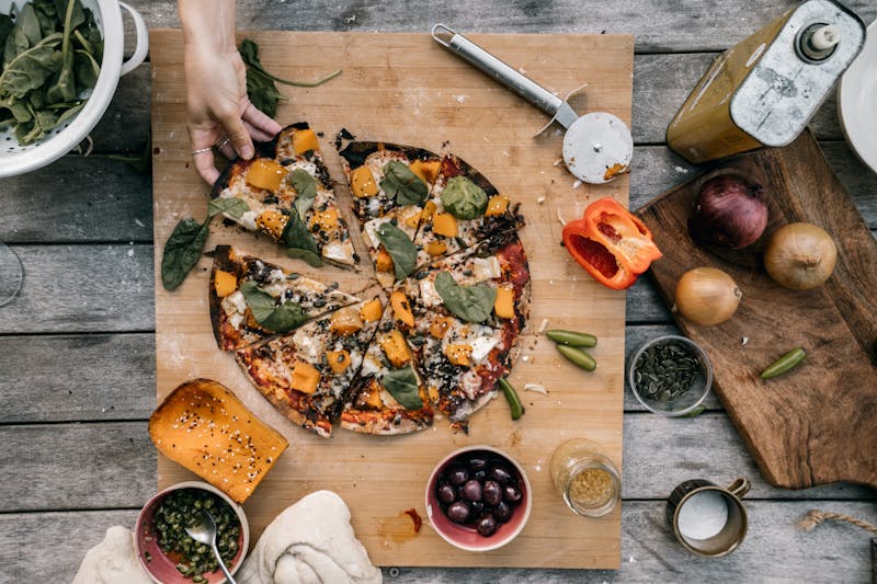 Garden Veggie mod pizza with colorful fresh vegetables